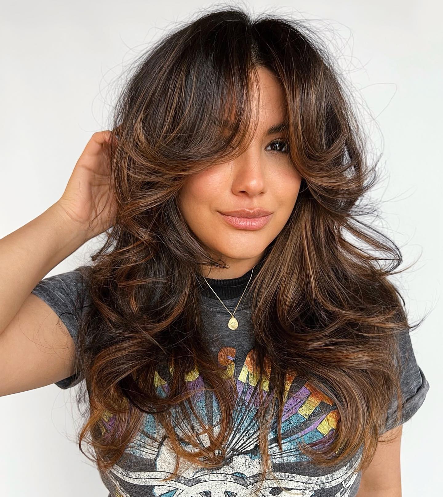 Long Shattered Hairstyle with Voluminous Bangs